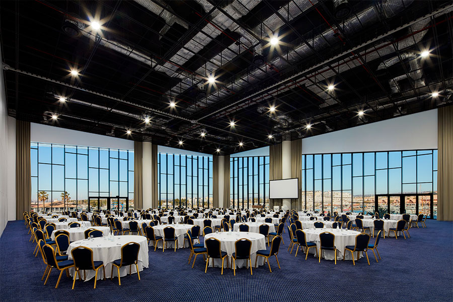 Meeting room with cabaret layout in the Algarve Congress Centre with panoramic views over the ocean and Vilamoura Marina